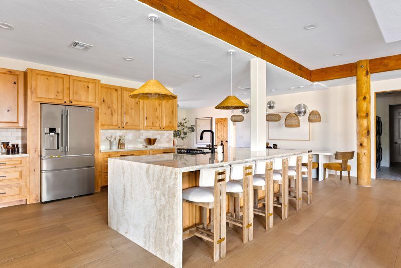 The kitchen with the waterfall island