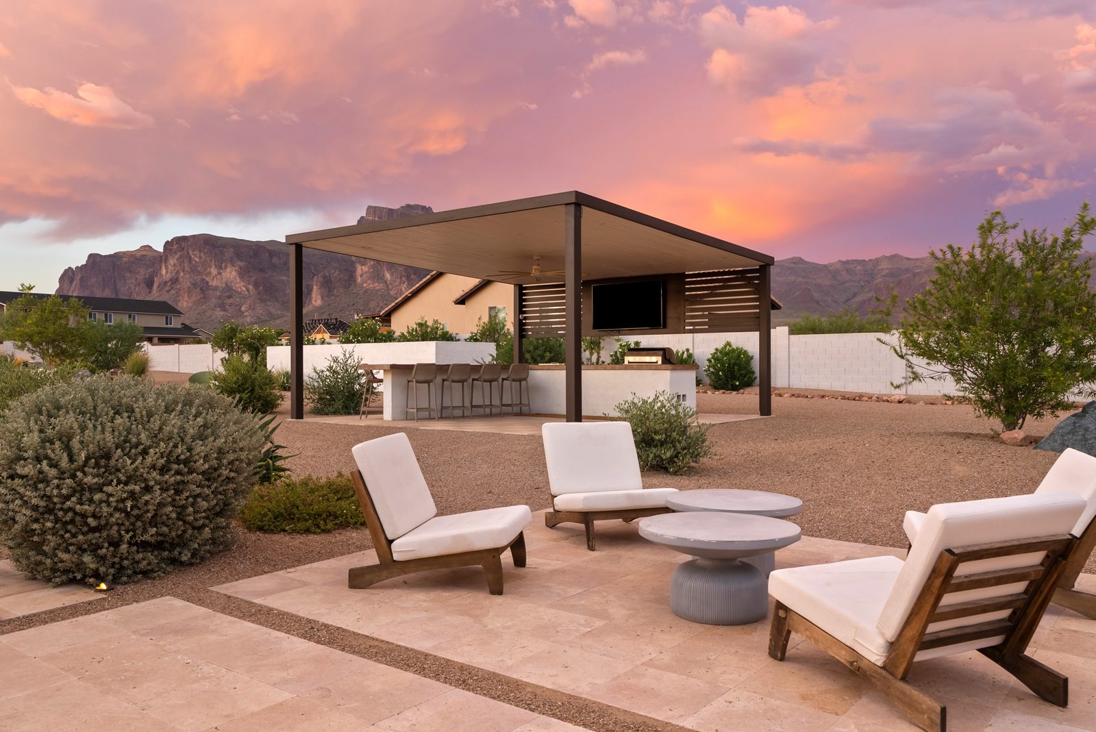 The pergola and outdoor kitchen at dusk