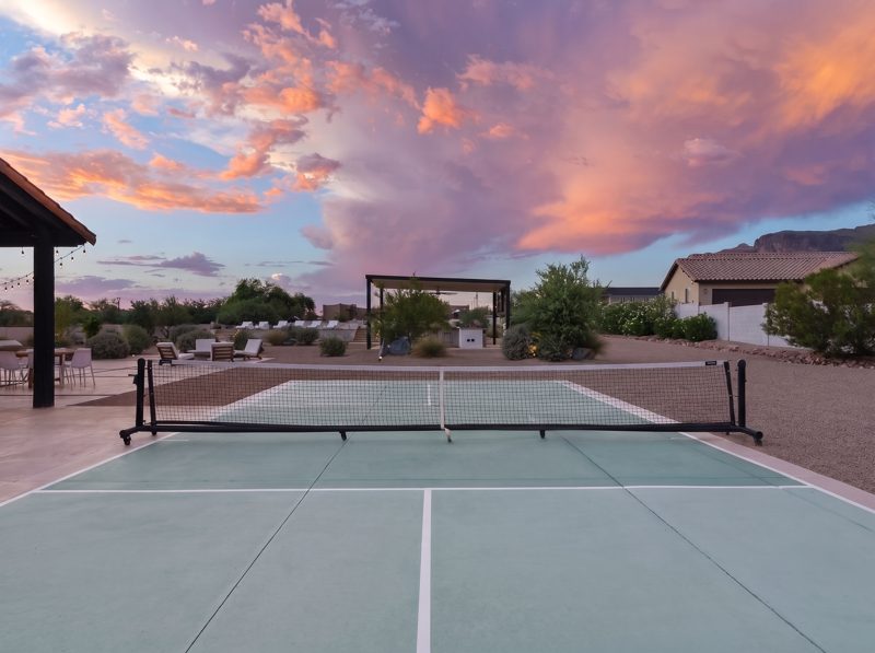 The pickleball court at sunset