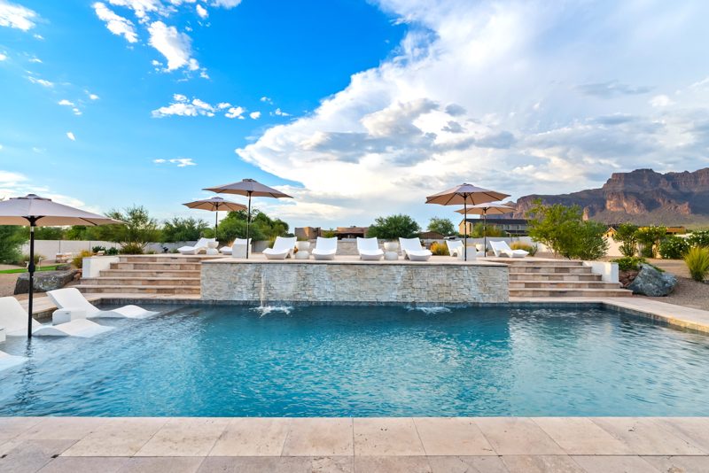 The pool in daylight with the mountain behind