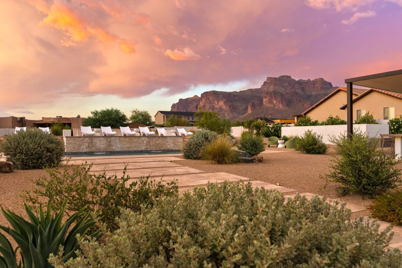 The pool and the Superstition Mountains at twilight